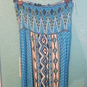 Turquoise blue with green and white pattern dress.